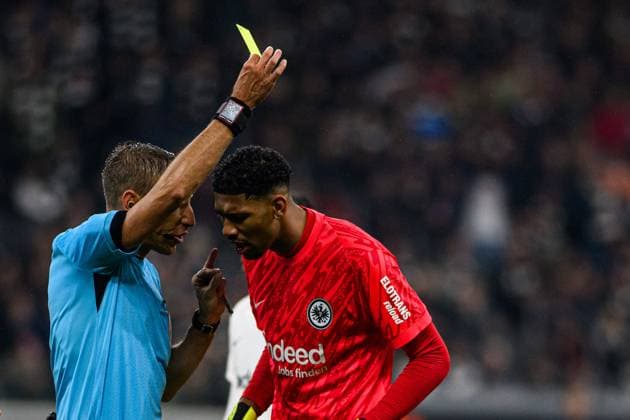 FRANKFURT, GERMANY - 17 APRIL, 2025: Referee, Filippo Meli, Kaua Santos - The UEFA Europa League football match between Eintracht Frankfurt vs Tottenham Hotspur F.C. at Deutsche Bank Park.  Copyright: xVitaliixKliuievx