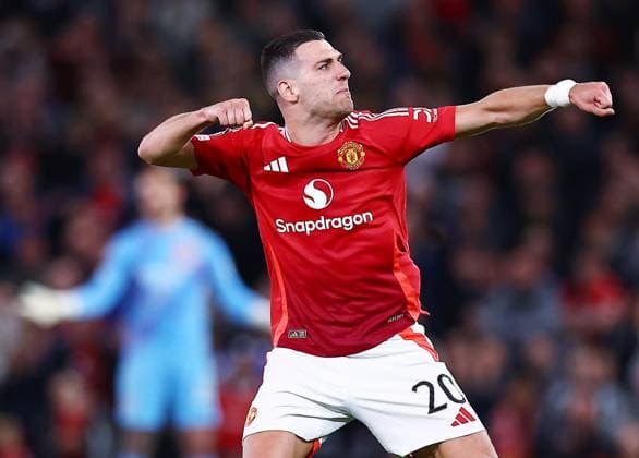 Diogo Dalot of Manchester United, ManU celebrates scoring a goal to make it 2-0 Manchester United v Olympique Lyonnais, UEFA Europa League, Quarter Final, Second Leg, Football, Old Trafford, Manchester, UK - 17 Apr 2025 EDITORIAL USE ONLY No use with unauthorised audio, video, data, fixture lists, club league logos or live services. Online in-match use limited to 120 images, no video emulation. No use in betting, games or single club league player publications. Copyright: xMattxWest Shutterstockx 15253946v