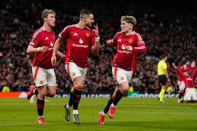 Manchester, England, 17th April 2025. Diogo Dalot of Manchester United, ManU celebrates his goal to make it 2-0 during the Manchester United vs Olympique Lyonnais Quarter Final 2nd Leg UEFA Europa League match at Old Trafford, Manchester. Picture credit should read: Andrew Yates Sportimage EDITORIAL USE ONLY. No use with unauthorised audio, video, data, fixture lists, club league logos or live services. Online in-match use limited to 120 images, no video emulation. No use in betting, games or single club league player publications. SPI_087_AY_MANCHESTER_UNITED_V_OLYMPIQUE_LYONNAIS SPI-3844-0056