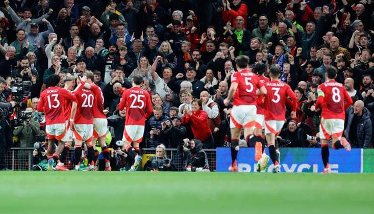 17th April 2025; Old Trafford, Manchester, England; Europa League Quarter Final Second Leg Football, Manchester United, ManU versus Lyon; United players celebrate a goal scored by Diogo Dalot of Manchester United (20) in the 45th minute to make the score 2-0  ActionPlus12775555 RogerxEvans