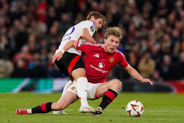 Manchester, England, 17th April 2025. Rasmus Hojlund of Manchester United, ManU and Tanner Tessmann of Lyon battle for the ball during the Manchester United vs Olympique Lyonnais Quarter Final 2nd Leg UEFA Europa League match at Old Trafford, Manchester. Picture credit should read: Andrew Yates Sportimage EDITORIAL USE ONLY. No use with unauthorised audio, video, data, fixture lists, club league logos or live services. Online in-match use limited to 120 images, no video emulation. No use in betting, games or single club league player publications. SPI_097_AY_MANCHESTER_UNITED_V_OLYMPIQUE_LYONNAIS SPI-3844-0064