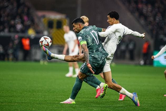 FRANKFURT, GERMANY - 17 APRIL, 2025: Cristian Romero, Hugo Ekitike - The UEFA Europa League football match between Eintracht Frankfurt vs Tottenham Hotspur F.C. at Deutsche Bank Park.  Copyright: xVitaliixKliuievx