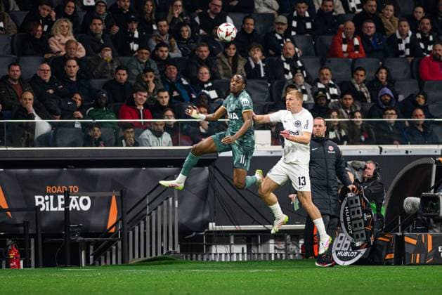 FRANKFURT, GERMANY - 17 APRIL, 2025: Mathys Tel, Rasmus Kristensen - The UEFA Europa League football match between Eintracht Frankfurt vs Tottenham Hotspur F.C. at Deutsche Bank Park.  Copyright: xVitaliixKliuievx