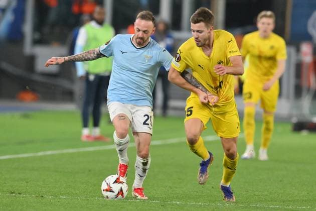17th April 2025, Stadio Olimpico, Rome, Italy; UEFA Europa League Quarter Final Second Leg Football; Lazio versus Bodo Glimt; Manuel Lazzari of SS Lazio under pressure from Fredrik Andre Bjorkan of Bodo Glimt  ActionPlus12775613 AllShotLive