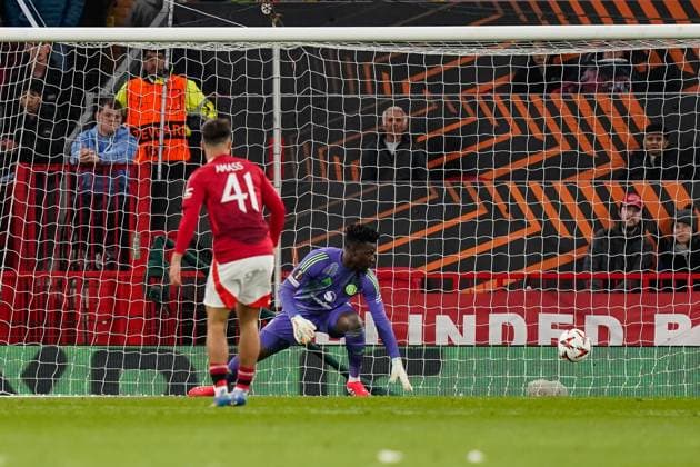 Manchester, England, 17th April 2025. AndrÃ Onana of Manchester United, ManU is beaten by the shot of Rayan Cherki of Lyon to make the score 2-3 during the Manchester United vs Olympique Lyonnais Quarter Final 2nd Leg UEFA Europa League match at Old Trafford, Manchester. Picture credit should read: Andrew Yates Sportimage EDITORIAL USE ONLY. No use with unauthorised audio, video, data, fixture lists, club league logos or live services. Online in-match use limited to 120 images, no video emulation. No use in betting, games or single club league player publications. SPI_132_AY_MANCHESTER_UNITED_V_OLYMPIQUE_LYONNAIS SPI-3844-0085