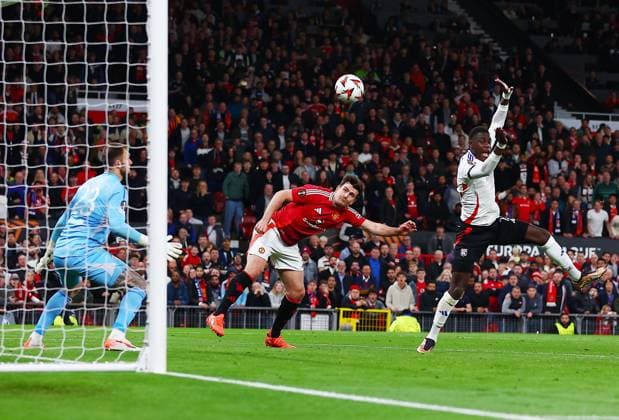 Harry Maguire of Manchester United, ManU scores a goal to make it 5-4 Manchester United v Olympique Lyonnais, UEFA Europa League, Quarter Final, Second Leg, Football, Old Trafford, Manchester, UK - 17 Apr 2025 EDITORIAL USE ONLY No use with unauthorised audio, video, data, fixture lists, club league logos or live services. Online in-match use limited to 120 images, no video emulation. No use in betting, games or single club league player publications.  Copyright: xMattxWest Shutterstockx 15253946bc