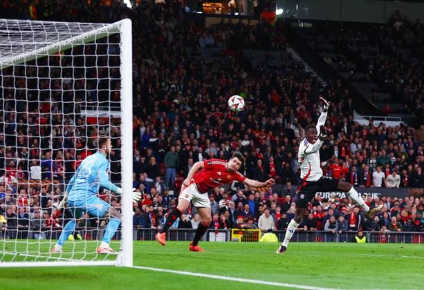 Harry Maguire of Manchester United, ManU scores a goal to make it 5-4 Manchester United v Olympique Lyonnais, UEFA Europa League, Quarter Final, Second Leg, Football, Old Trafford, Manchester, UK - 17 Apr 2025 EDITORIAL USE ONLY No use with unauthorised audio, video, data, fixture lists, club league logos or live services. Online in-match use limited to 120 images, no video emulation. No use in betting, games or single club league player publications.  Copyright: xMattxWest Shutterstockx 15253946cc