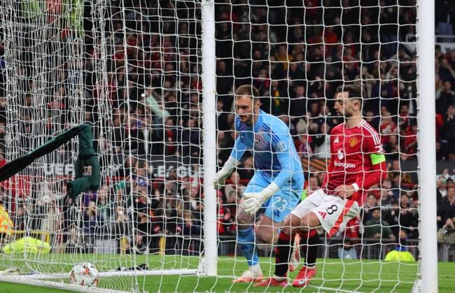 17th April 2025; Old Trafford, Manchester, England; Europa League Quarter Final Second Leg Football, Manchester United, ManU versus Lyon; Bruno Fernandes of Manchester United collects the ball after scoring from the spot to make the score 3-4 in the 114th minute  ActionPlus12775744 RogerxEvans
