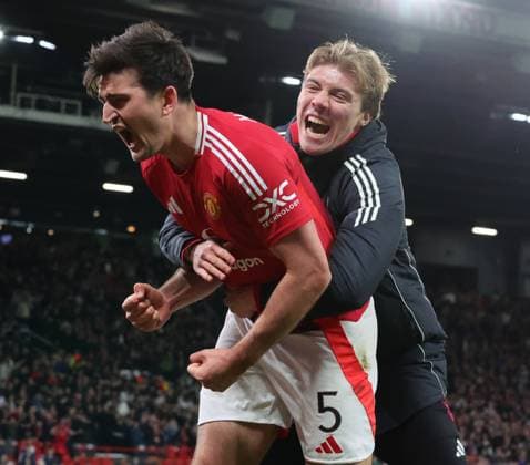 17th April 2025; Old Trafford, Manchester, England; Europa League Quarter Final Second Leg Football, Manchester United, ManU versus Lyon; Harry Maguire of Manchester United celebrates with Rasmus Hojlund of Manchester United after he scored in the 121st minute to make the score 5-4 to United  ActionPlus12775761 RogerxEvans