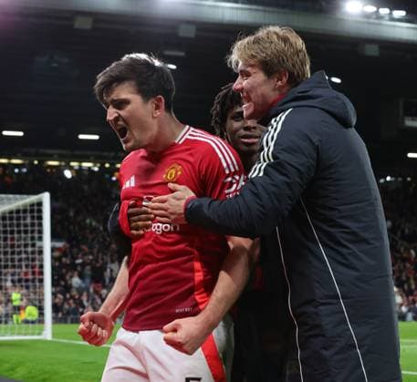 17th April 2025; Old Trafford, Manchester, England; Europa League Quarter Final Second Leg Football, Manchester United, ManU versus Lyon; Harry Maguire of Manchester United celebrates with Rasmus Hojlund of Manchester United after he scored in the 121st minute to make the score 5-4 to United  ActionPlus12775763 RogerxEvans