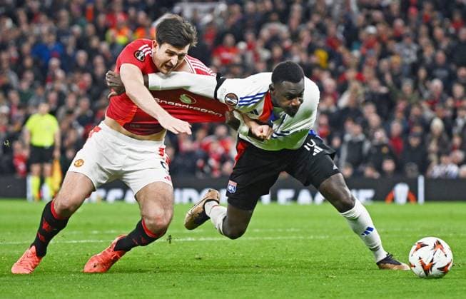 Match Europa League Manchester United, ManU - OL PHOTOPQR LE PROGRES Stéphane GUIOCHON - Manchester 17 04 2025 - Match Europa League Manchester United - OL -En Angleterre à Manchester 1 4 de finale retour de l Europa League saison 2024-2025 Manchester United - OL ici Harry Maguire et Moussa Niakhaté Manchester France  Copyright: xPHOTOPQR LExPROGRES MAXPPPxStéphanexGUIOCHONx 20250418LPL9833 20250418LPL9833
