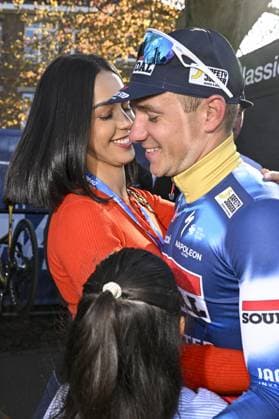 Belgian Remco Evenepoel of Soudal Quick-Step and his wife Oumi Rayane celebrate after winning the men s Brabantse Pijl one day cycling race, 162,5km from Huizingen, Beersel to Overijse on Friday 18 April 2025. TOM GOYVAERTS TomxGoyvaerts  x121160625x