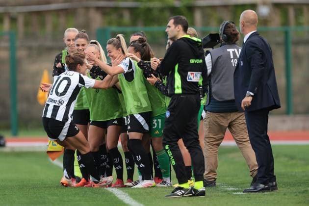 Biella, Italy, 18th April 2025. Massimiliano Canzi Head coach of Juventus looks on as Cristiana Girelli of Juventus celebrates with team mates after scoring to give the side a 2-0 lead during the Juventus Women vs AC Milan Women Serie A Femminile match at Stadio Vittorio Pozzo, Biella. Picture credit should read: Jonathan Moscrop Sportimage EDITORIAL USE ONLY. No use with unauthorised audio, video, data, fixture lists, club league logos or live services. Online in-match use limited to 120 images, no video emulation. No use in betting, games or single club league player publications. SPI_075_JM_JUVE_MILAN_FEMM_ SPI-3835-0075