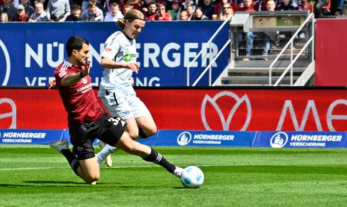 19 04 2024 Soccer season 2024 2025 2 Soccer Bundesliga 30 Matchday 1 FC Nuremberg FCN Club SC Paderborn 07 SCP Sportfoto Zink xwoxzix DFL regulations prohibit any use of photographs as image sequences and or quasi video only for editorial use Mahir Emreli 30, 1 FC Nuremberg FCN scores goal Goal shot for 1 0 against Felix Götze 20, SC Paderborn 07