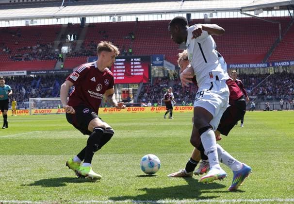 19 04 2024 Soccer Season 2024 2025 2 Soccer Bundesliga 30 Matchday 1 FC Nürnberg FCN Club SC Paderborn 07 SCP Sportfoto Zink DaMa xdaxmax DFL regulations prohibit any use of photographs as image sequences and or quasi video only for editorial use Tim Drexler 5, 1 FC Nürnberg FCN Ilyas Ansah 29, SC Paderborn 07 Tim Janisch 32, 1 FC Nürnberg FCN
