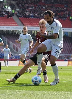 19 04 2024 Soccer Season 2024 2025 2 Soccer Bundesliga 30 Matchday 1 FC Nürnberg FCN Club SC Paderborn 07 SCP Sportfoto Zink DaMa xdaxmax DFL regulations prohibit any use of photographs as image sequences and or quasi video only for editorial use Tim Janisch 32, 1 FC Nürnberg FCN Ilyas Ansah 29, SC Paderborn 07