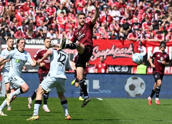 19 04 2024 Soccer Season 2024 2025 2 Soccer Bundesliga 30 Matchday 1 FC Nürnberg FCN Club SC Paderborn 07 SCP Sportfoto Zink xwoxzix DFL regulations prohibit any use of photographs as image sequences and or quasi video only for editorial use Mattes Hansen 22, SC Paderborn 07 Lukas Schleimer 36, 1 FC Nürnberg FCN