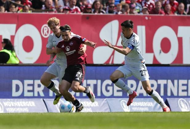 19 04 2024 Soccer Season 2024 2025 2 Soccer Bundesliga 30 Matchday 1 FC Nürnberg FCN Club SC Paderborn 07 SCP Sportfoto Zink DaMa xdaxmax DFL regulations prohibit any use of photographs as image sequences and or quasi video only for editorial use Mattes Hansen 22, SC Paderborn 07 Berkay Yilmaz 21, 1 FC Nürnberg FCN Raphael Obermair 23, SC Paderborn 07
