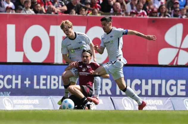 19 04 2024 Soccer Season 2024 2025 2 Soccer Bundesliga 30 Matchday 1 FC Nürnberg FCN Club SC Paderborn 07 SCP Sportfoto Zink DaMa xdaxmax DFL regulations prohibit any use of photographs as image sequences and or quasi video only for editorial use Mattes Hansen 22, SC Paderborn 07 Berkay Yilmaz 21, 1 FC Nürnberg FCN Raphael Obermair 23, SC Paderborn 07