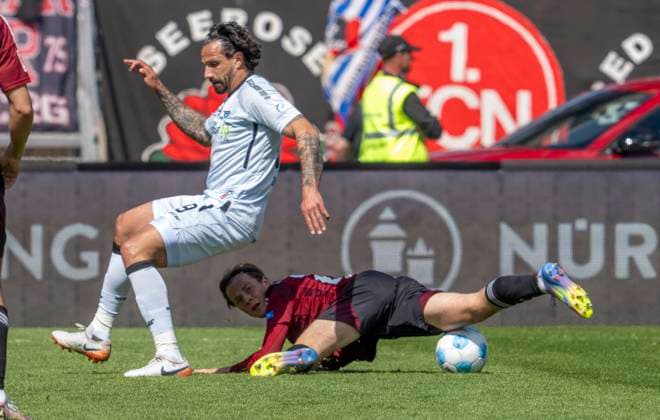 19 04 2024 Soccer Season 2024 2025 2 Soccer Bundesliga 30 Matchday 1 FC Nürnberg FCN Club SC Paderborn 07 SCP Sportfoto Zink xwoxzix DFL regulations prohibit any use of photographs as image sequences and or quasi video only for editorial use Adriano Grimaldi 39, SC Paderborn Caspar Jander 20, 1 FC Nürnberg FCN