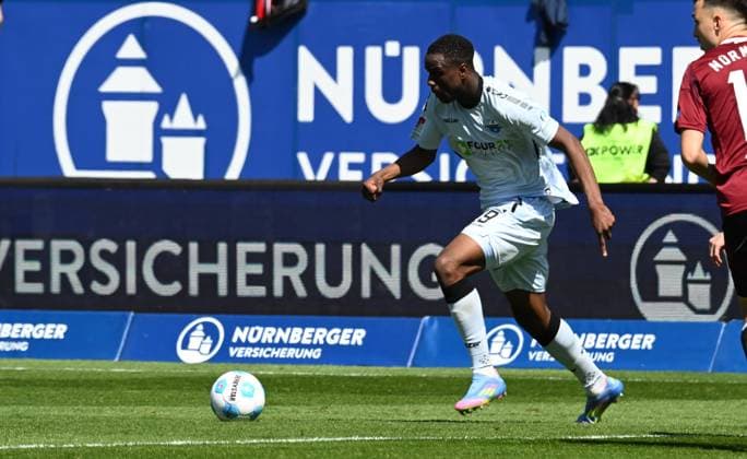 19 04 2024 Soccer Season 2024 2025 2 Soccer Bundesliga 30 Matchday 1 FC Nürnberg FCN Club SC Paderborn 07 SCP Sportfoto Zink xwoxzix DFL regulations prohibit any use of photographs as image sequences and or quasi video only for editorial use Ilyas Ansah 29, SC Paderborn 07 on the way to the goal Goal Shot to 1 2
