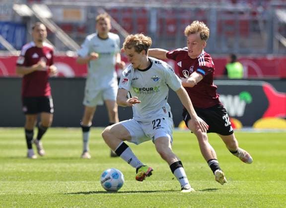 19 04 2024 Soccer Season 2024 2025 2 Soccer Bundesliga 30 Matchday 1 FC Nürnberg FCN Club SC Paderborn 07 SCP Sportfoto Zink DaMa xdaxmax DFL regulations prohibit any use of photographs as image sequences and or quasi video only for editorial use Mattes Hansen 22, SC Paderborn 07 Tim Janisch 32, 1 FC Nürnberg FCN
