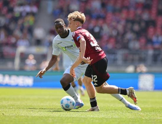 19 04 2024 Soccer Season 2024 2025 2 Soccer Bundesliga 30 Matchday 1 FC Nürnberg FCN Club SC Paderborn 07 SCP Sportfoto Zink DaMa xdaxmax DFL regulations prohibit any use of photographs as image sequences and or quasi video only for editorial use Ilyas Ansah 29, SC Paderborn 07 Tim Janisch 32, 1 FC Nürnberg FCN