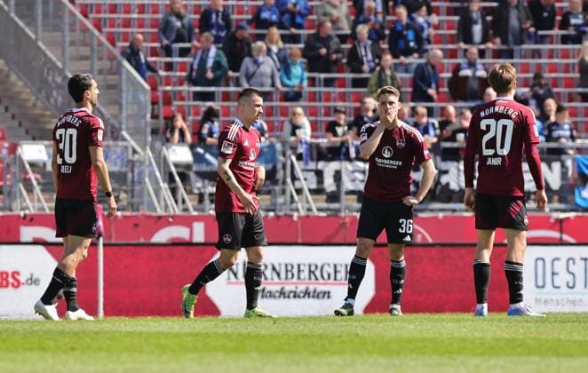 19 04 2024 Soccer Season 2024 2025 2 Soccer Bundesliga 30 Matchday 1 FC Nürnberg FCN Club SC Paderborn 07 SCP Sportfoto Zink DaMa xdaxmax DFL regulations prohibit any use of photographs as image sequences and or quasi video only for editorial use Mahir Emreli 30, 1 FC Nürnberg FCN Oliver Villadsen 2, 1 FC Nürnberg FCN Lukas Schleimer 36, 1 FC Nürnberg FCN Caspar Jander 20, 1 FC Nürnberg FCN disappointed Disappointment after the end of the match