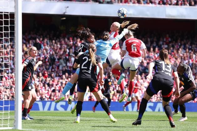 London, England, 19th April 2025. Christiane Endler of Lyon appears to punch the head of Leah Williamson of Arsenal for which she is shown a yellow card and Arsenal are awarded a penalty during the Arsenal Women vs Olympique Lyonnais UEFA Womens Champions League match at the Emirates Stadium, London. Picture credit should read: Paul Terry Sportimage EDITORIAL USE ONLY. No use with unauthorised audio, video, data, fixture lists, club league logos or live services. Online in-match use limited to 120 images, no video emulation. No use in betting, games or single club league player publications. SPI_027_PT_Arsenal_w_Lyon_W SPI-3848-0030