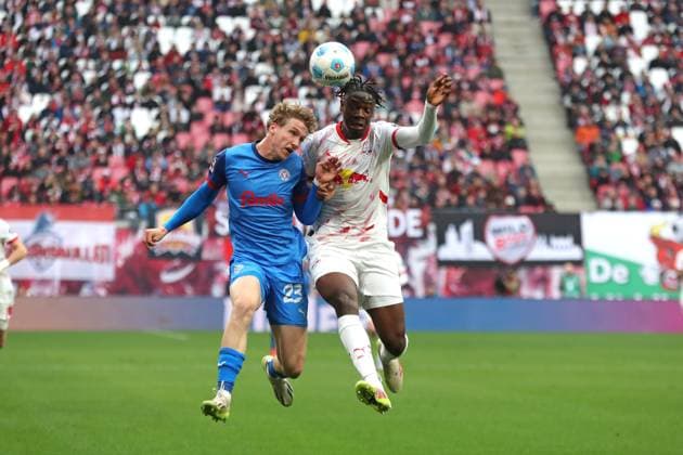1 Bundesliga RB Leipzig vs Holstein Kiel, 19 04 25 Lasse Rosenboom 23, Holstein Kiel and El Chadaille Bitshiabu 5, RB Leipzig in aerial duel, duel Football, 1 Bundesliga, Season 2024 2025, Matchday 30 RB Leipzig vs Holstein Kiel on 19 04 25 at Red Bull Arena, Leipzig DFL REGULATIONS PROHIBIT ANY USE OF PHOTOGRAPHS AS IMAGE SEQUENCES AND OR QUASI VIDEO Copyright: xBEAUTIFULxSPORTS JanxKaeferx