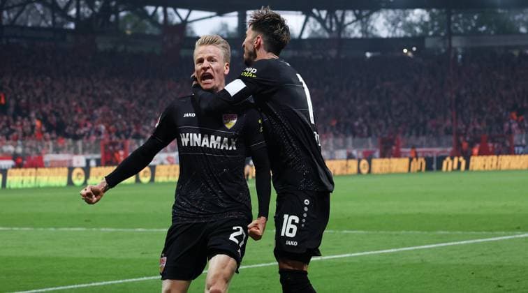 Berlin , Bundesliga Soccer 1 FC Union Berlin vs VfB Stuttgart, celebrating the goal to 3-4, from left scorer Chris Führich, Atakan Karazor VfB According to the regulations of the DFL German Soccer League, it is prohibited to use or have used photographs taken in the stadium and or of the game in the form of sequential images and or video-like photo series
