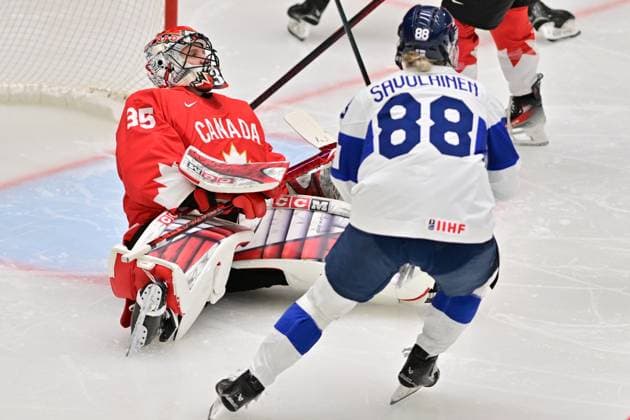 Goalkeeper Ann-Renee Desbien of Canada gives up a goal during the Ice hockey, Eishockey IIHF WomenÂ s World Championship, WM, Weltmeisterschaft semifinal match Canada vs Finland, Ceske Budejovice, Czech Republic, April 19, 2025. At right is Ronja Savolainen of Finland. (CTKxPhoto VaclavxPancer) CTKPhotoP2025041904967  CTKPhotoP2025041904967