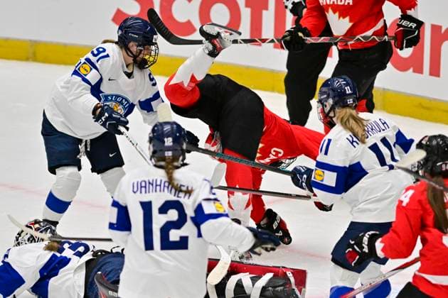 From left Julia Liikala of Finland and Marie-Philip Poulin of Canada in action during the Ice hockey, Eishockey IIHF WomenÂ s World Championship, WM, Weltmeisterschaft semifinal match Canada vs Finland, Ceske Budejovice, Czech Republic, April 19, 2025. (CTKxPhoto VaclavxPancer) CTKPhotoP2025041905239  CTKPhotoP2025041905239