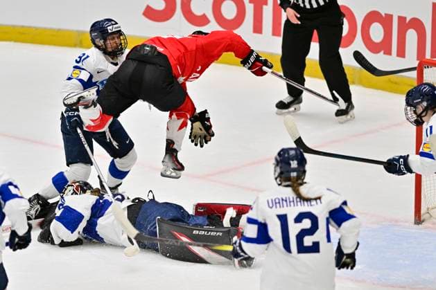 (L-R) Julia Liikala of Finland, Marie-Philip Poulin of Canada and goalkeeper Emilia Kyrkko of Finland in action during the Ice hockey, Eishockey IIHF WomenÂ s World Championship, WM, Weltmeisterschaft semifinal match Canada vs Finland, Ceske Budejovice, Czech Republic, April 19, 2025. (CTKxPhoto VaclavxPancer) CTKPhotoP2025041905240  CTKPhotoP2025041905240