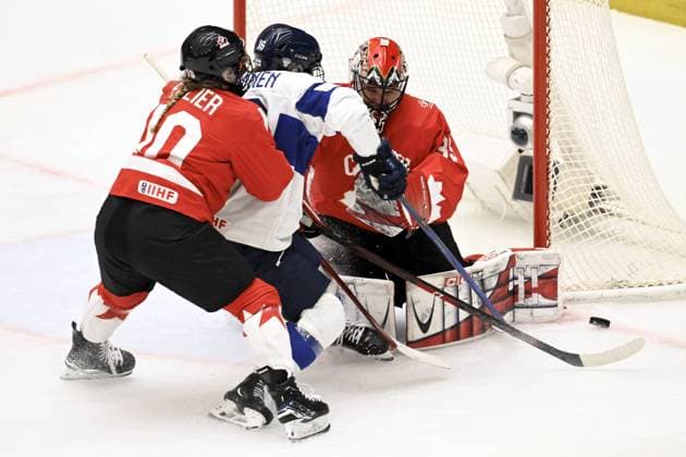 Finland s Petra Nieminen (16) at the goal of Canada s goalkeeper Ann-Renee Desbiens during the IIHF Women s Ice hockey, Eishockey World Championship, WM, Weltmeisterschaft semifinal match between Canada and Finland in Ceske Budejovice, Czechia, on April 19, 2025, left Canada s Sarah Fillier. Ceske Budejovice Czechia LKFTJK20250419212510MTTT  Copyright: xEmmixKorhonenx LKFTJK20250419212510MTTT
