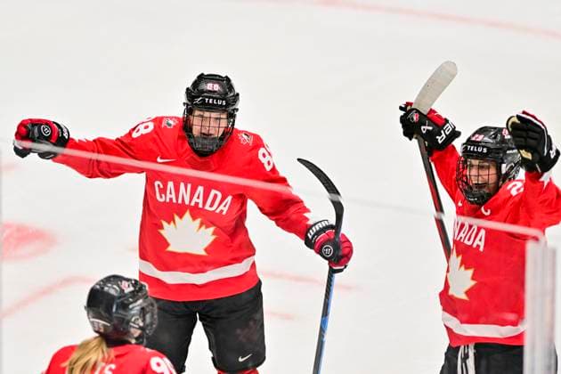 Julia Gosling, left, and Marie-Philip Poulin celebrate a goal during the Ice hockey, Eishockey IIHF WomenÂ s World Championship, WM, Weltmeisterschaft semifinal match Canada vs Finland, Ceske Budejovice, Czech Republic, April 19, 2025. (CTKxPhoto VaclavxPancer) CTKPhotoP2025041905743  CTKPhotoP2025041905743