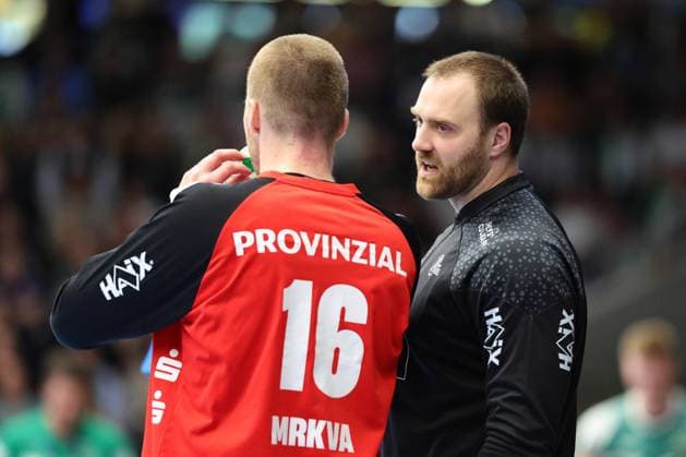 BAU 19 04 2025 Göppingen Handball FRISCH AUF Göppingen vs THW Kiel, f l Tomas Mrkva Kiel Andreas Wolf Kiel