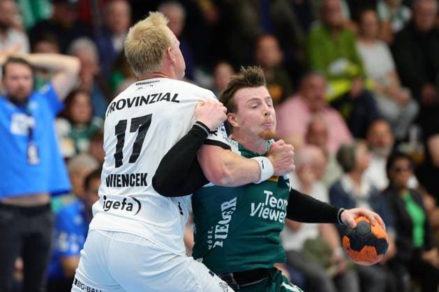 BAU 19 04 2025 Göppingen Handball FRISCH AUF Göppingen vs THW Kiel, f l Patrick Wiencek Kiel Erik Persson Göppingen