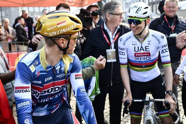 Belgian Remco Evenepoel of Soudal Quick-Step and Slovenian Tadej Pogacar of UAE Team Emirates pictured at the start of the men elite Amstel Gold Race one day cycling race, 255,9 km from Maastricht to Valkenburg, The Netherlands, Sunday 20 April 2025. DIRKxWAEM  x121299216x