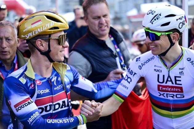 Belgian Remco Evenepoel of Soudal Quick-Step and Slovenian Tadej Pogacar of UAE Team Emirates pictured at the start of the men elite Amstel Gold Race one day cycling race, 255,9 km from Maastricht to Valkenburg, The Netherlands, Sunday 20 April 2025. DIRKxWAEM  x121299217x