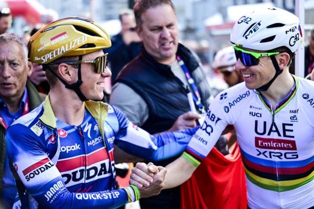 Belgian Remco Evenepoel of Soudal Quick-Step and Slovenian Tadej Pogacar of UAE Team Emirates pictured at the start of the men elite Amstel Gold Race one day cycling race, 255,9 km from Maastricht to Valkenburg, The Netherlands, Sunday 20 April 2025. DIRKxWAEM  x121299224x