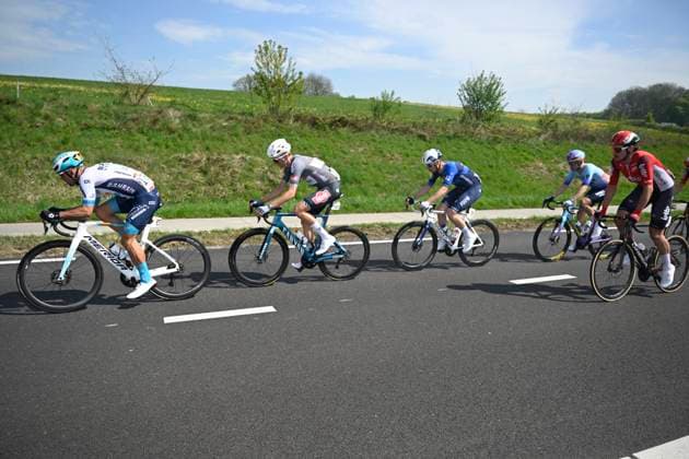 Amstel Gold Race 2025 cycling race VALKENBURG, THE NETHERLANDS - APRIL 20 : Wright Fred (GBR) of Bahrain - Victorious, Verstrynge Emiel (BEL) of Alpecin - Deceuninck, Cavagna Remi (FRA) of Groupama FDJ, Beullens Cedric (BEL) of Lotto during the Men Elite UCI World Tour 59th Amstel Gold Race cycling race with start in Maastricht and finish in Valkenburg (255,9 km) on April 20, 2025 in Valkenburg, The Netherlands, 20 04 2025 ( Motordriver Kenny Verfaillie & Valkenburg The Netherlands  Copyright: xNicoxVereeckenx