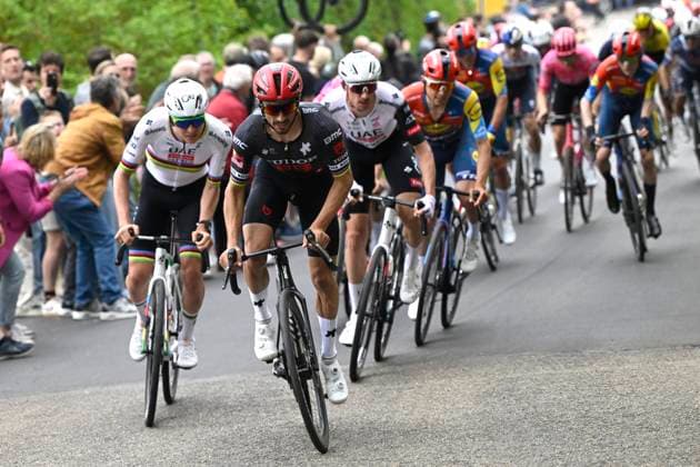 Amstel Gold Race 2025 cycling race VALKENBURG, THE NETHERLANDS - APRIL 20 : Alaphilippe Julian (FRA) of Tudor Pro Cycling Team and Pogacar Tadej (SLO) of UAE Team Emirates during the Men Elite UCI World Tour 59th Amstel Gold Race cycling race with start in Maastricht and finish in Valkenburg (255,9 km) on April 20, 2025 in Valkenburg, The Netherlands, 20 04 2025 ( Motordriver Kenny Verfaillie & Valkenburg The Netherlands  Copyright: xNicoxVereeckenx