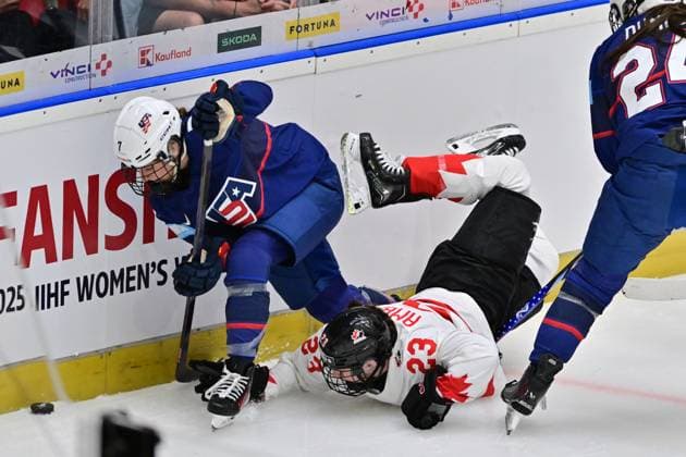 Lacey Eden of USA, left, and Erin Ambrose of Canada in action during the Ice hockey, Eishockey IIHF WomenÂ s World Championship, WM, Weltmeisterschaft the gold medal match USA vs Canada, Ceske Budejovice, Czech Republic, April 20, 2025. (CTKxPhoto VaclavxPancer) CTKPhotoP2025042004344  CTKPhotoP2025042004344