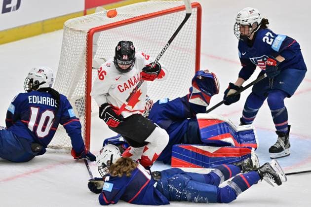 (L-R) Laila Edwards and Caroline Harvey of USA, Emily Clark of Canada, goalkeeper Aerin Frankel of USA and Taylor Heise of USA in action during the Ice hockey, Eishockey IIHF WomenÂ s World Championship, WM, Weltmeisterschaft the gold medal match USA vs Canada, Ceske Budejovice, Czech Republic, April 20, 2025. (CTKxPhoto VaclavxPancer) CTKPhotoP2025042004713  CTKPhotoP2025042004713