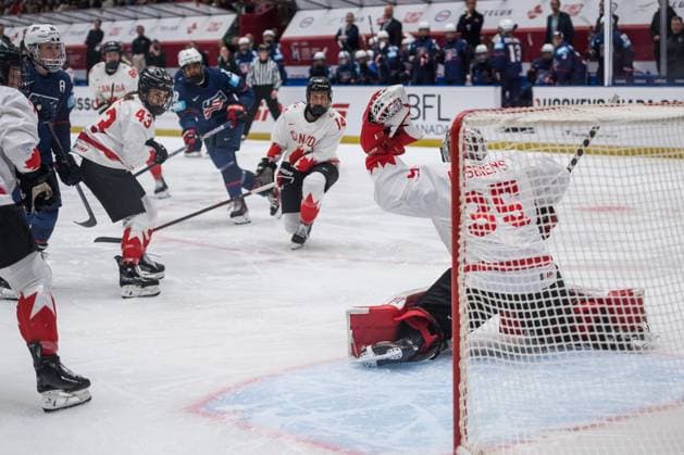 (L-R) Alex Carpenter of USA, Kristin O Neill and Renata Fast of Canada and goalkeeper Ann-Renee Desbiens of Canada in action during the Ice hockey, Eishockey IIHF WomenÂ s World Championship, WM, Weltmeisterschaft the gold medal match USA vs Canada, Ceske Budejovice, Czech Republic, April 20, 2025. (CTKxPhoto PetrxSkrivanek) CTKPhotoP2025042004848  CTKPhotoP2025042004848