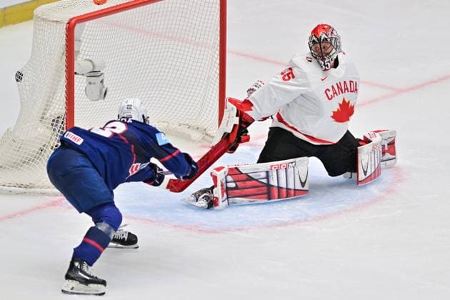 Tessa Janecke of USA, left, scores during the Ice hockey, Eishockey IIHF WomenÂ s World Championship, WM, Weltmeisterschaft the gold medal match USA vs Canada, Ceske Budejovice, Czech Republic, April 20, 2025. At right is goalkeeper Ann-Renee Desbiens of Canada. (CTKxPhoto VaclavxPancer) CTKPhotoP2025042005470  CTKPhotoP2025042005470