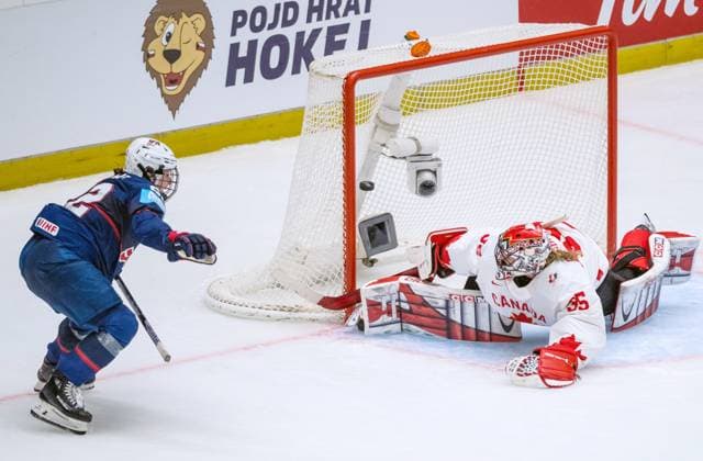Tessa Janecke of USA, left, scores during the Ice hockey, Eishockey IIHF WomenÂ s World Championship, WM, Weltmeisterschaft the gold medal match USA vs Canada, Ceske Budejovice, Czech Republic, April 20, 2025. At right is goalkeeper Ann-Renee Desbiens of Canada. (CTKxPhoto PetrxSkrivanek) CTKPhotoP2025042005538  CTKPhotoP2025042005538