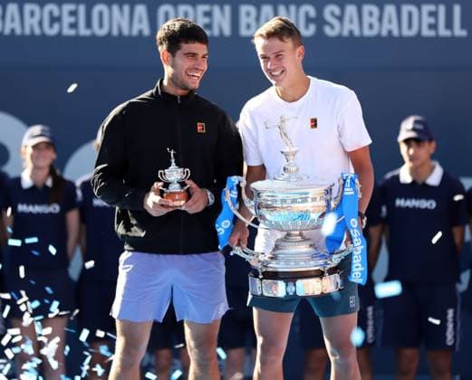 April 20, 2025, Sabadell, Barcelona, Spain: Barcelona Spain 20.04.2025 Carlos Alcaraz (Spain) and Holger Rune (Denmark) pose with the titles in the match between Carlos Alcaraz (Spain) and Holger Rune (Denmark) during the Day 7 of the Barcelona Open Banc Sabadell Godo on 20 April 2025 in Barcelona. Sabadell Spain - ZUMAu50_ 20250420_zsp_u50_083 Copyright: xXavixUrgelesx