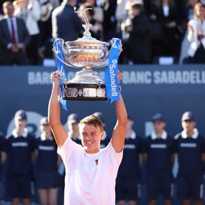 April 20, 2025, Sabadell, Barcelona, Spain: Barcelona Spain 20.04.2025 Holger Rune (Denmark) lifts the Barcelona Open title in the match between Carlos Alcaraz (Spain) and Holger Rune (Denmark) during the Day 7 of the Barcelona Open Banc Sabadell Godo on 20 April 2025 in Barcelona. Sabadell Spain - ZUMAu50_ 20250420_zsp_u50_120 Copyright: xXavixUrgelesx